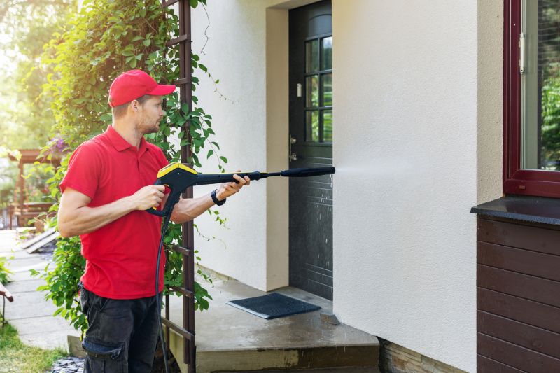Powerwashing Technician Operating Equipment